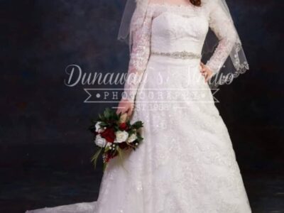 Oleg Cassini Wedding Dress CWG765 Size 12 - comes with Veil, Sash, and Petticoat