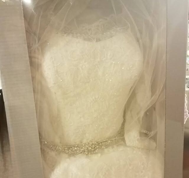 Oleg Cassini Wedding Dress CWG765 Size 12 - comes with Veil, Sash, and Petticoat