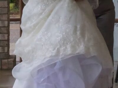 Oleg Cassini Wedding Dress CWG765 Size 12 - comes with Veil, Sash, and Petticoat